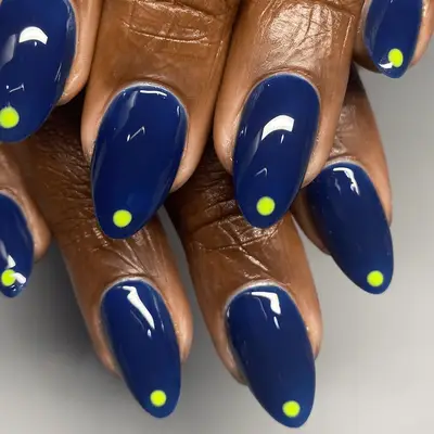 navy nails with abstract accent nails