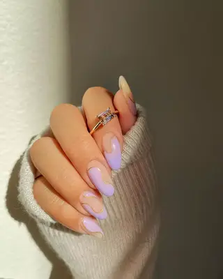 Lavender and gold nails.
