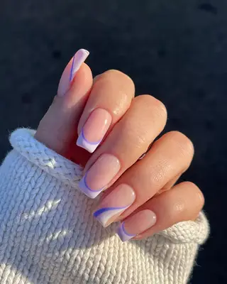 Two-toned lavender french nails.