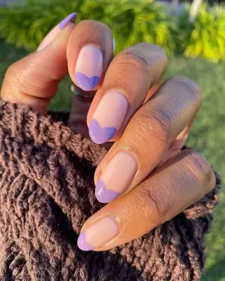 Lavender purple heart French manicure.