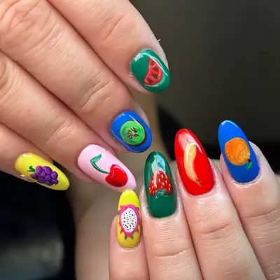 a manicure with fruity nail designs