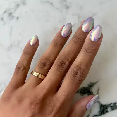 a purple iridescent mermaidcore manicure on short nails