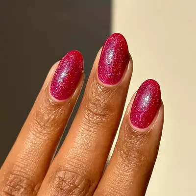a sparkly pink manicure