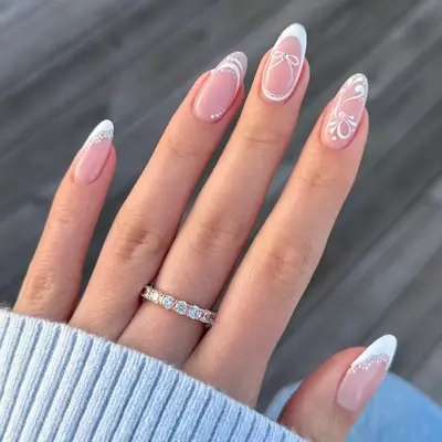 Manicure with tortoiseshell design on one hand and floral design on the other