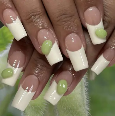 Which French tips with green, bean-shaped accents