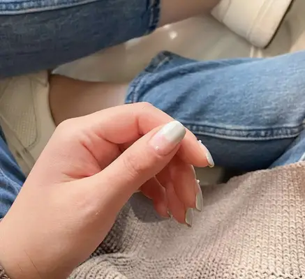 A French manicure with the white tip going half way down the nail