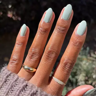 an icy mint blue manicure
