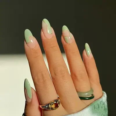 a mint green negative space manicure