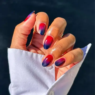 Berry ombré manicure.