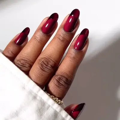 Double berry-colored ombré French manicure.