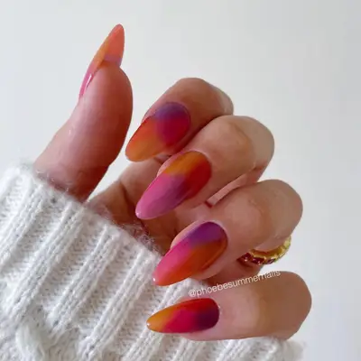 Watercolor berry-colored nails.