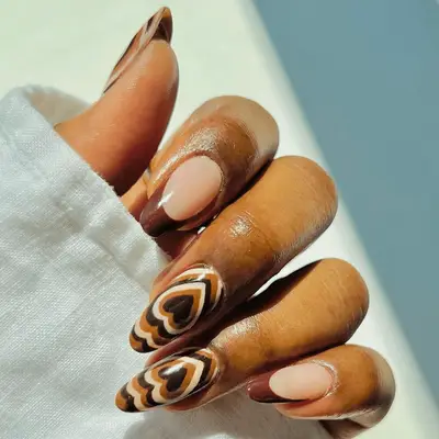 Close up of a manicure in shades of brown