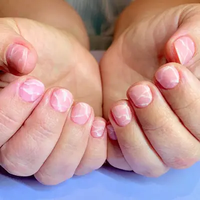 Millennial pink rose quartz manicure.