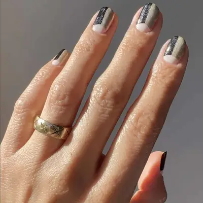 A manicure in thirds, in neutral shades