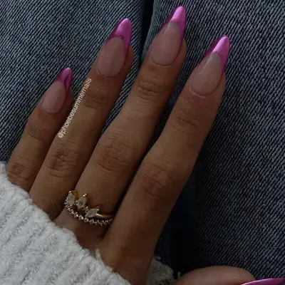 A pink chrome French tip manicure