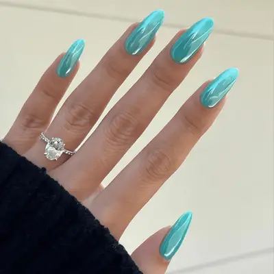 baby blue chrome nails 