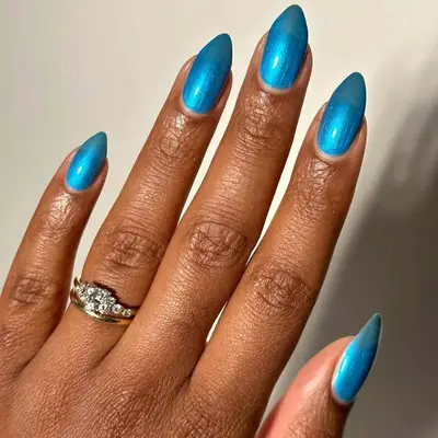 teal chrome nails