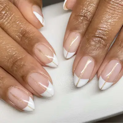 french manicure with gold lining down the middle