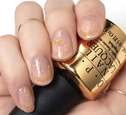 metallic gold flecks on short nails 