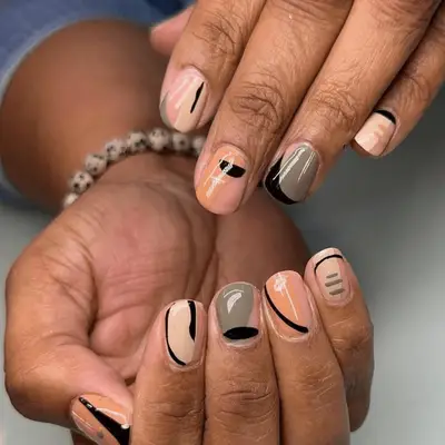 Muted colored geometric abstract manicure