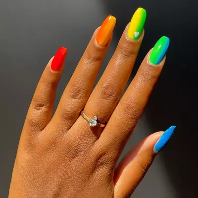 model with rainbow design with a small heart