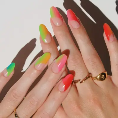 manicure with rainbow fade and negative space