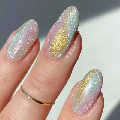 an iridescent pastel cat eye manicure