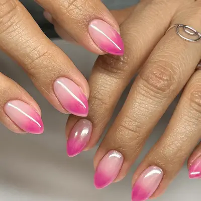 Almond shaped nails with pink chrome gradient french manicure