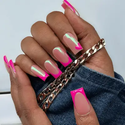 Chrome nails with neon pink french tips