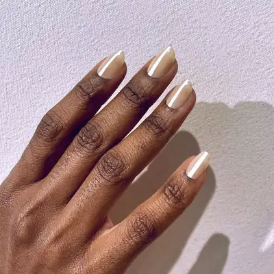 White Stripe nail design on nude nails