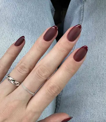Matte red manicure with shiny red french tip