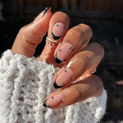 Neutral manicure with rhinestone accents