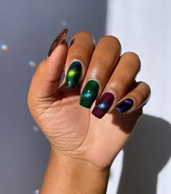 Jewel-colored cat eye nails