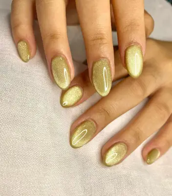 gold and yellow cateye nails
