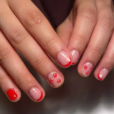 short nails with strawberries and red french tips