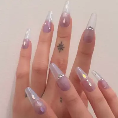 Clear, icy blue jelly nails with sparkle decals