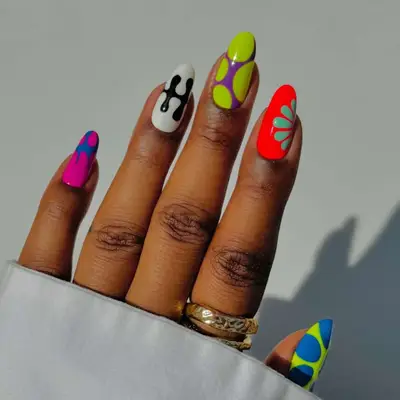 model with neon nails with abstract designs