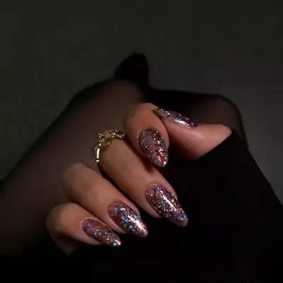 Chunky pink and silver glitter manicure.