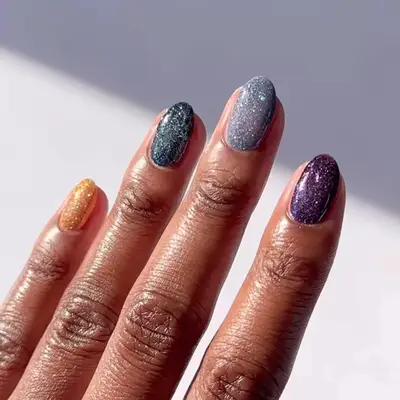 a sparkly skittle manicure 