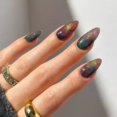 a watercolor manicure with shimmer