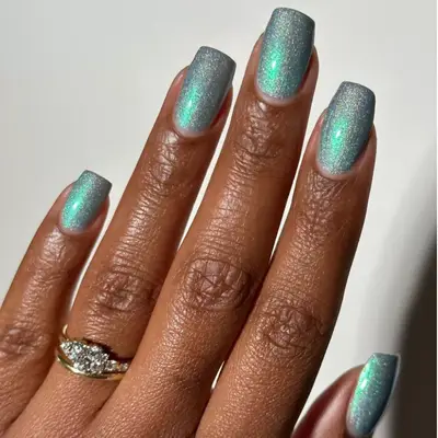 Turquoise shimmer manicure. 