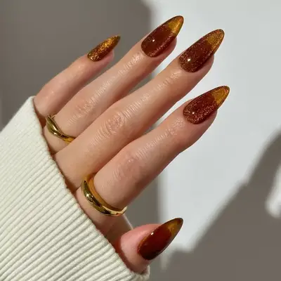 Brown jelly nails.