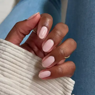 sheer pink nails with gold cuticle detailing