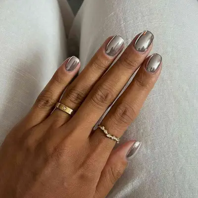 a metallic silver square manicure