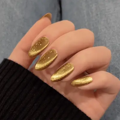 a black and pearlescent white star manicure