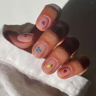 Neutral short nails with teeny fruit nail art 