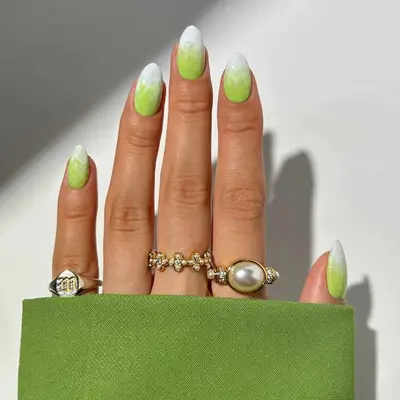 Manicure with matcha green and white gradient design