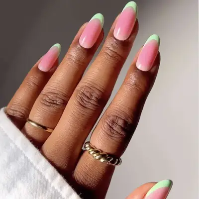 manicure with pink base and green french tips