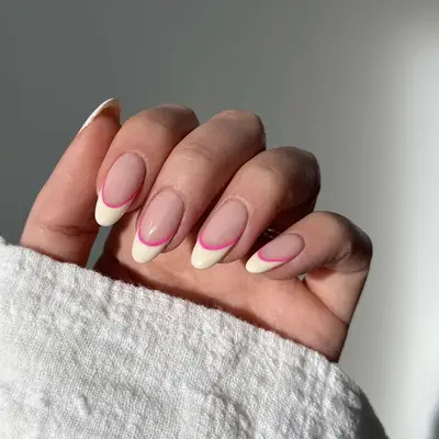 Cream french tips with hot pink lining
