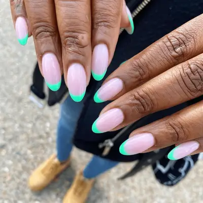 model with gingham French tip nails with cherries and cherry blossoms